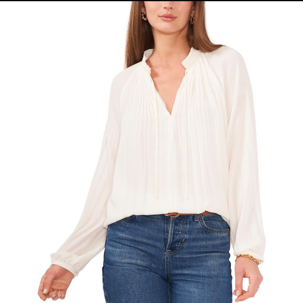 Vince Camuto White Blouse with Shutter pleat. Never been worn